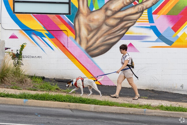 Residents of 10th and Page are able to walk their dogs on well kept sidewalks.