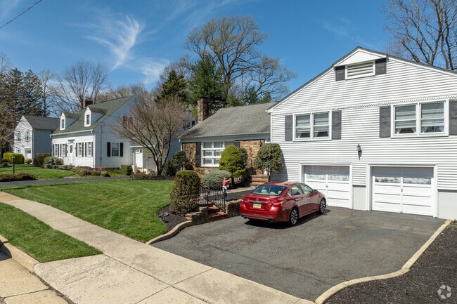 Rows of colonial homes on quiet streets are common in Freehold.
