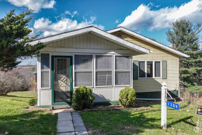 Prewar frame homes appear across Parks Township’s wooded lanes.