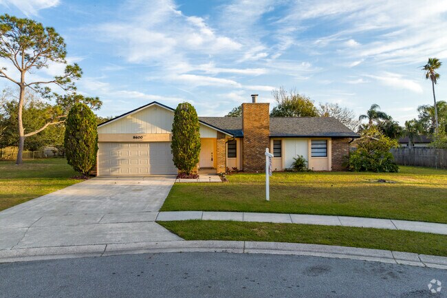 Many homes in the Goldenrod neighborhood offer large driveways and garages.