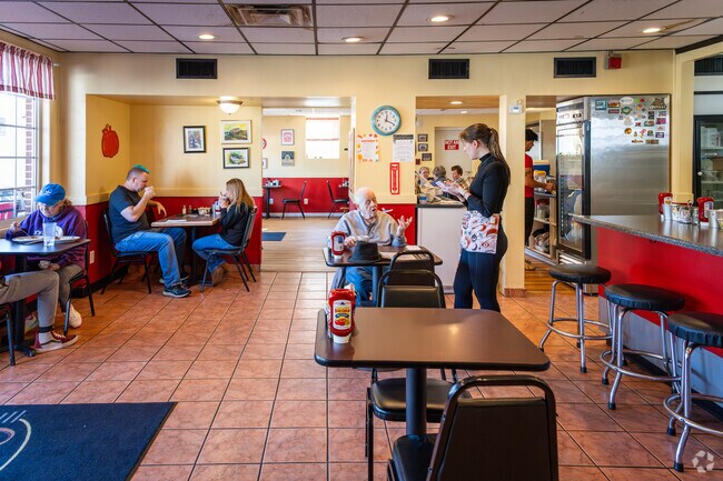 Kickstart your day at Ollie's Diner, a breakfast spot loved by Monastery Heights locals.