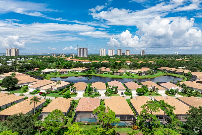 Most homes in Pelican Landing feature backyard swimming pools and waterfront views.