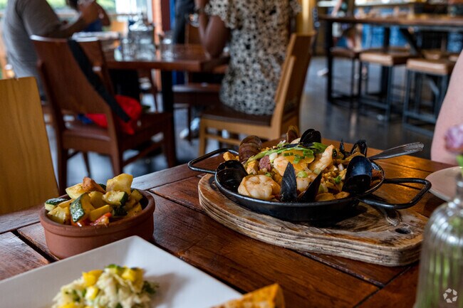 Tacos, tapas, and even paella can be held at Calle Latina outside Winnona Park Historic District.