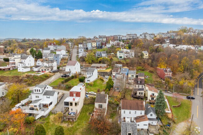Homes in South Side Slopes are perched on the craggy hills of Appalachia.