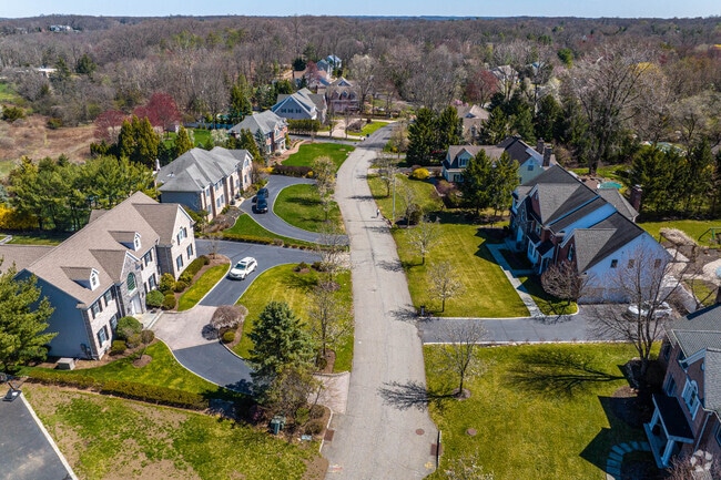 Neighborhoods with large homes and front lawns are common in Franklin Lakes