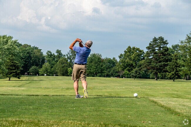 Golfers enjoy league night at The Elms Country Club in West Brookfield.