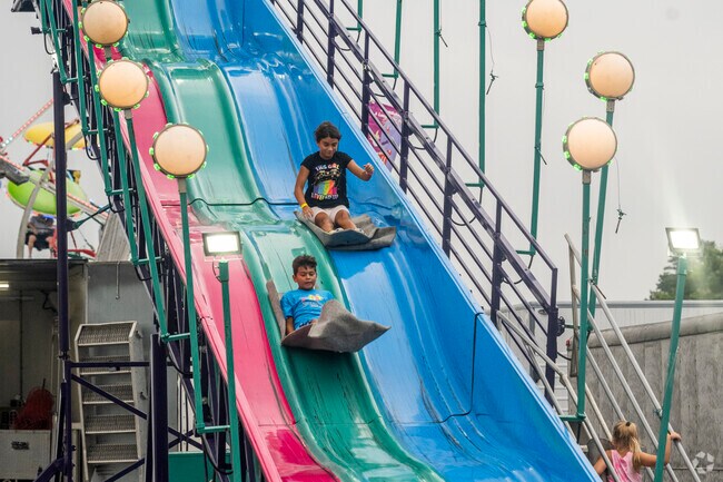 Reach the speed of light on the Big Slide at the Parish Family Festival.