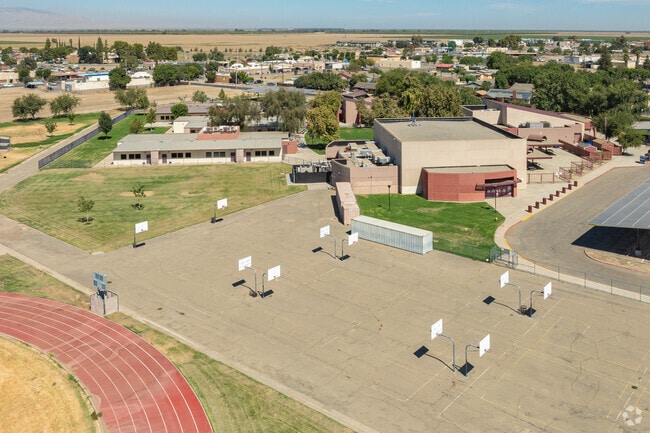 Huron Middle School offers large grass and concrete areas for students to play and relax.