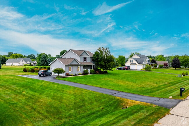 Modern suburban developments feature spacious single-family homes in Oceola Township.