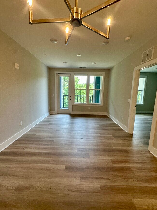 Hardwoods throughout. View of balcony