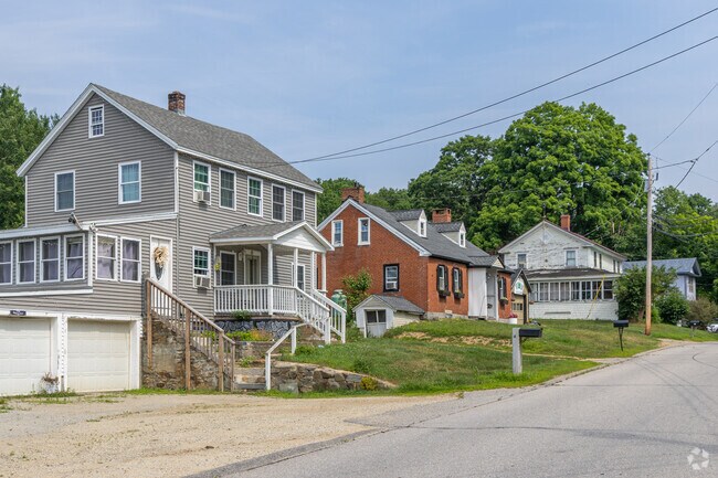 A row of Colonial and Cape Cod inspired homes in the Barnstead neighborhood.