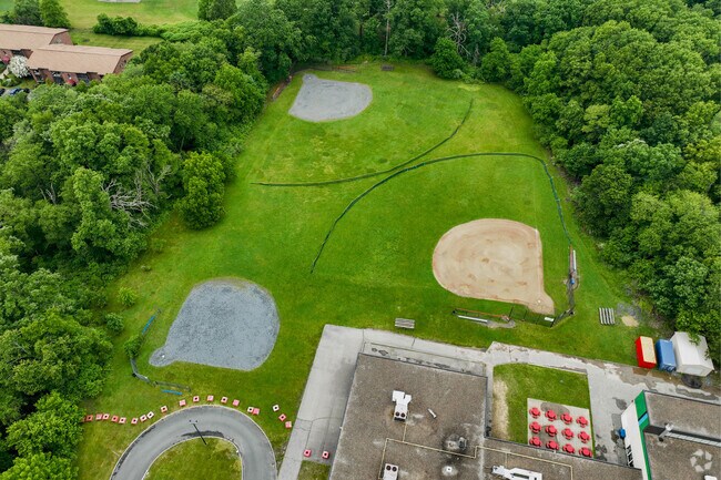 Multiple fields rest in the back of Raymond Elementary School in Brockton.