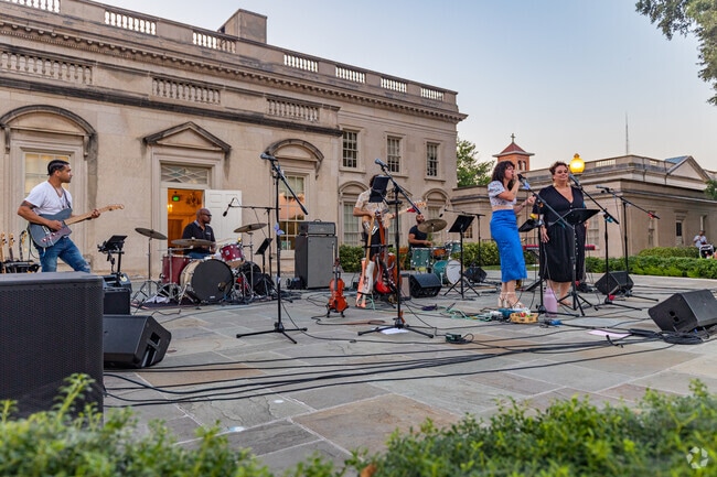 Residents of Highland Park enjoy free music hosted around town, like this one at the VMFA.