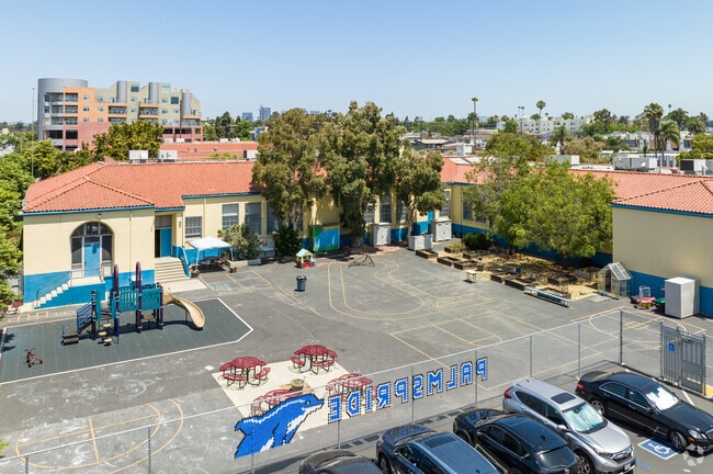 Palms Elementary School in Palms, CA features a playground with lots of space and tables.