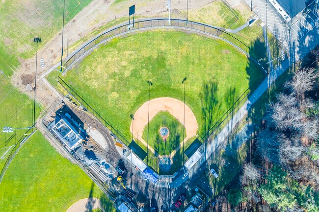 An aerial top-down view of the baseball field at John F. Kennedy Elementary School in Canton, MA