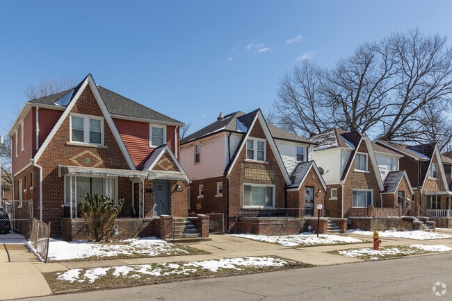 A row of brick Tudor homes in Harmony Village.