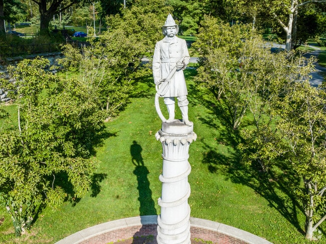 Outlet Area celebrates its history with statues throughout the City Park.