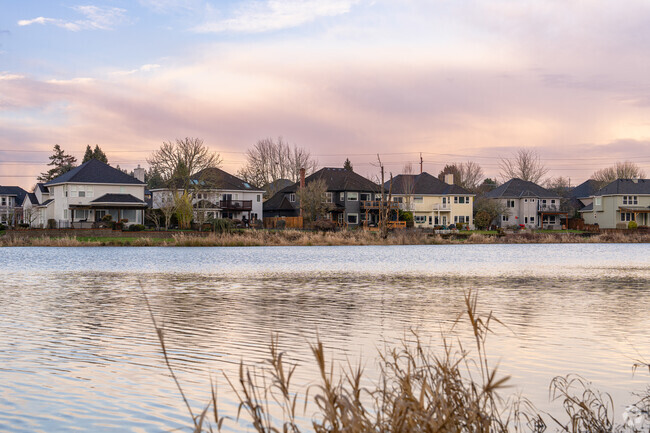 Traditional homes around Bethany Lake Park enjoy waterfront access and views of the tranquil waters.