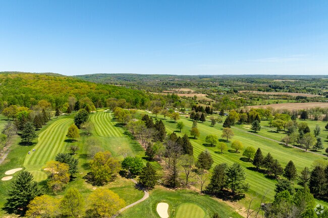 Oak Hill Golf Club in Holland offers a scenic and challenging course, perfect for golfers looking to enjoy a peaceful day surrounded by nature and beautiful views.