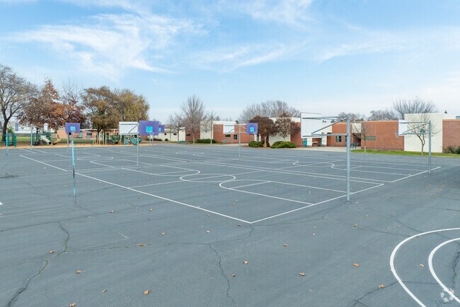 Students at Maeola E. Beitzel Elementary School can play basketball on the blacktop.