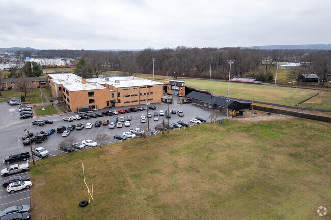 The student population of Holy Cross High School is 237.