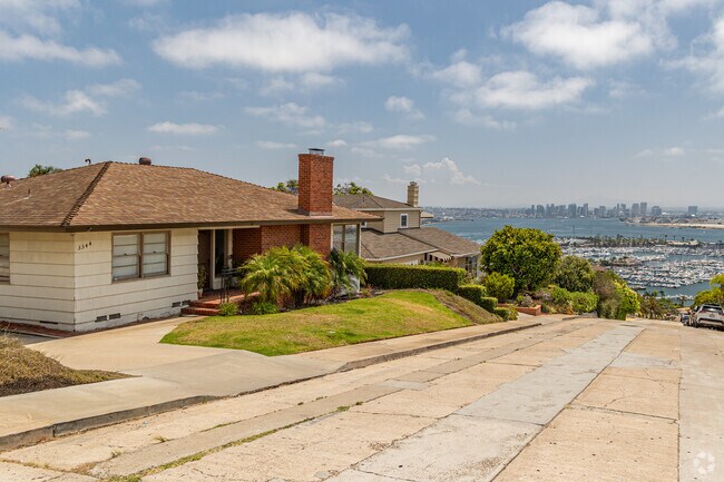 Some Wooded Area homes enjoy epic views of Downtown San Diego.