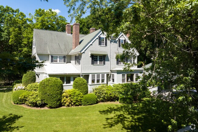 Well-kept lawns are a common feature in Worcester’s Forest Grove neighborhood.