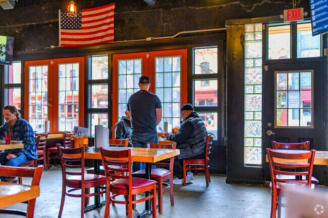 Friends enjoy some barbeque at Meat BBQ in Old Town, near Hull Court Park.