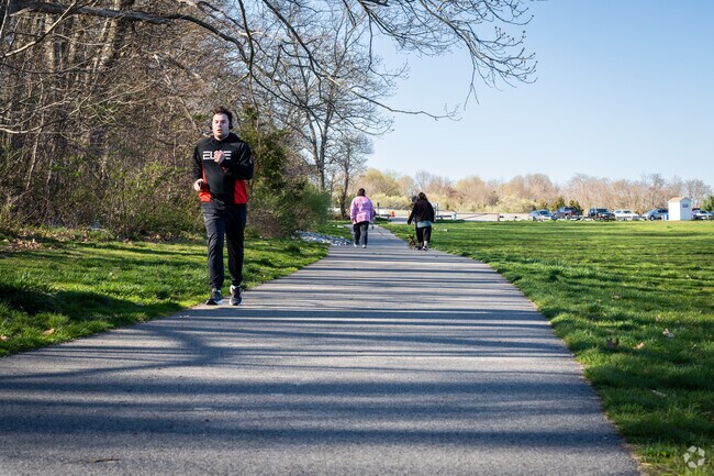 Embark on a scenic run amidst nature's beauty at Rocky Point State Park nestled in Warwick Neck.