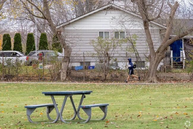 A local resident jogs through Twin City Park in North Chicago.