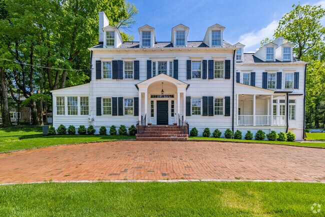 Historic colonial homes are common throughout the scenic village of Oyster Bay Cove.