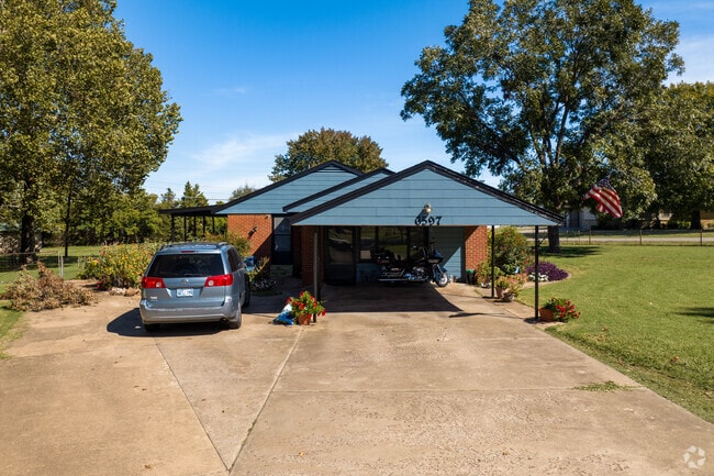 This Johansen Acres home has an overhanging garage area.