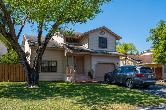 Homes in Kendale Lakes often include attached garages for convenience.