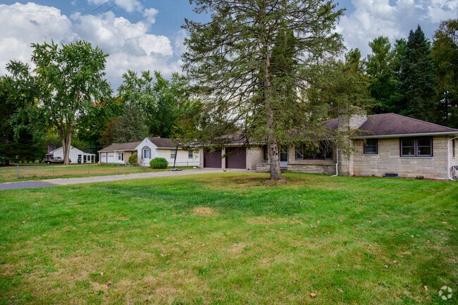 A series of ranch homes with large front yards located in the Comstock Northwest neighborhood.