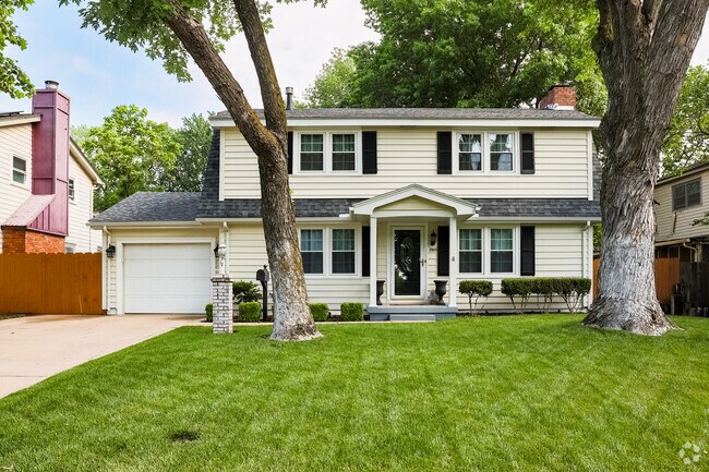 This home in Northwest Big River is a large two-story home with asymmetrical windows.
