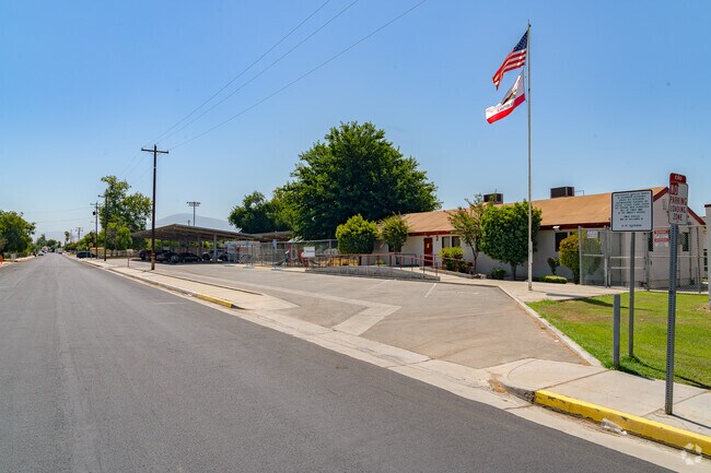 The flag flies high in front of Lamont Elementary.