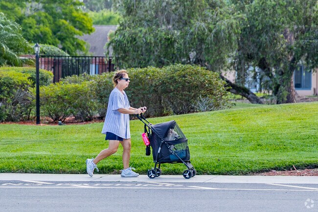 Residents at Heritage Lake enjoy a walk along the many sidewalks through the neighborhood.
