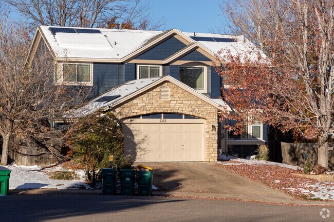 The curb appeal of this multi-level Jackson Farm home is off the charts.
