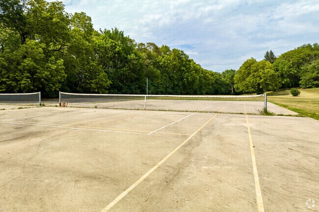Lake-Bristol Square residents play tennis with friends at nearby Adams Park courts.