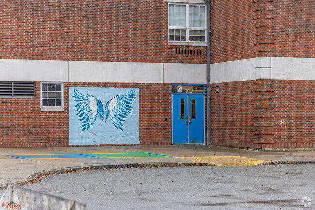 A mural on the backside of the Linscott-Rumford Elementary School in Woburn, MA.