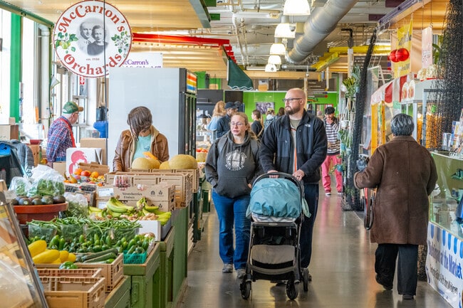 Flint Farmers Market booths offer Central Park visitors a range of shopping and dining options.
