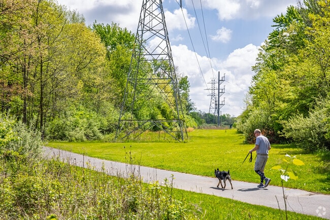 The Flint River Trail gives Northeast Village locals miles of paved trail to walk or bike along.