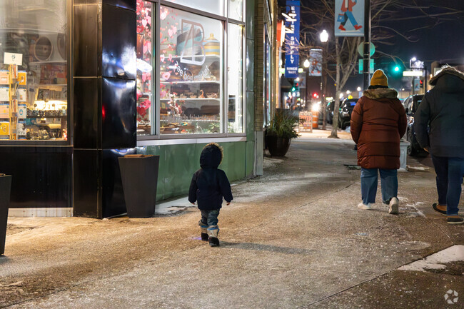 Family enjoys downtown Maplewood on this cold winter night.