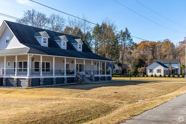 You'll find various architectural styles in Townsend, such as this new Farmhouse.