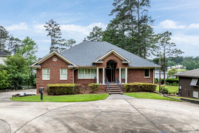 A Cottage-style design is known for steep roof overhangs and distinctive cross gables.