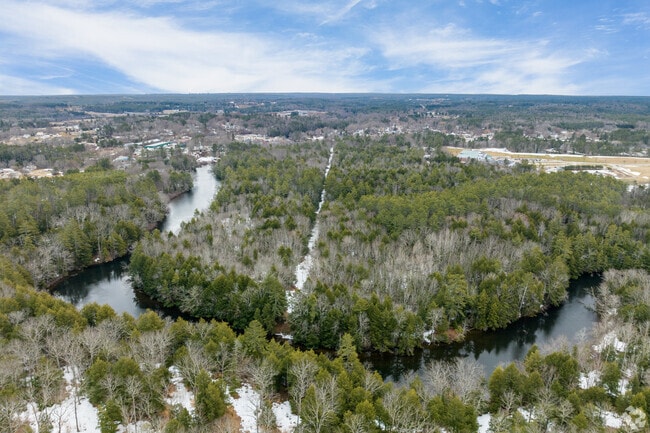 Hawkes Preserve is surrounded by the Presumpscot River, creating a peaceful retreat near Little Falls.