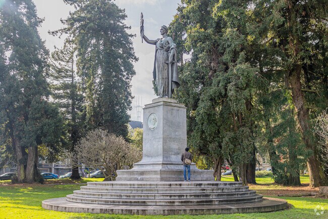 A visitor contemplates history at the William McKinley Memorial in North Park.