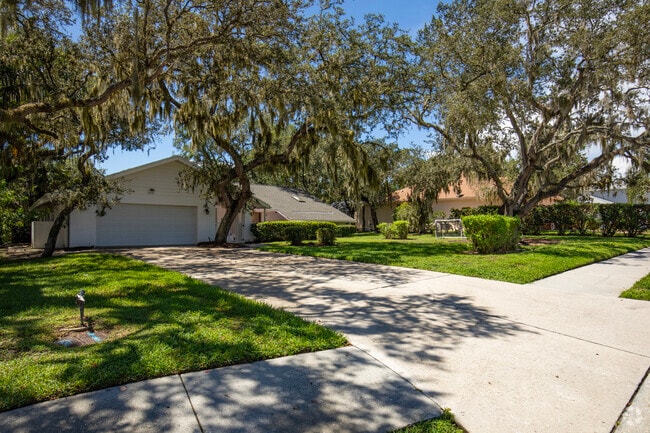 Many homes in Parrish sit back on tree-lined shady streets.