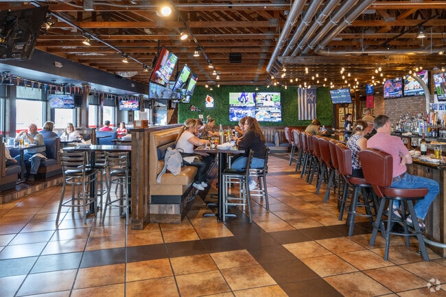 Watch your favorite sports team at BoomBozz Watch Bar in Hurstbourne Acres.