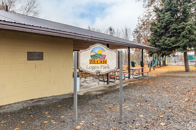 Loges Park features a playground and covered picnic tables for families in Zillah.